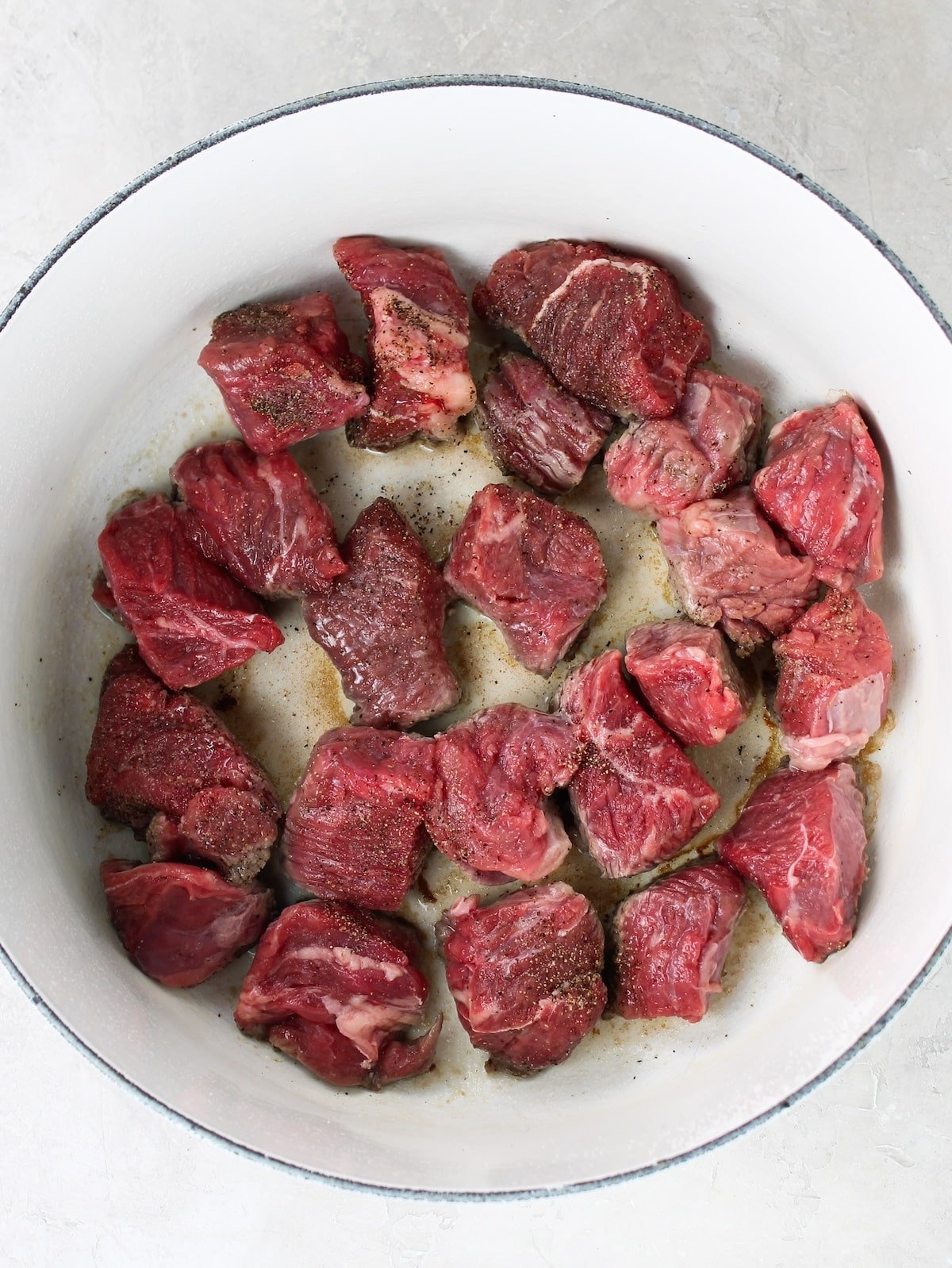 Searing cut-up chuck roast.