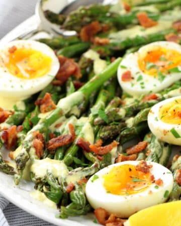 1200x1200 close-up photo of Asparagus Egg and Bacon Salad with Dijon Vinaigrette.