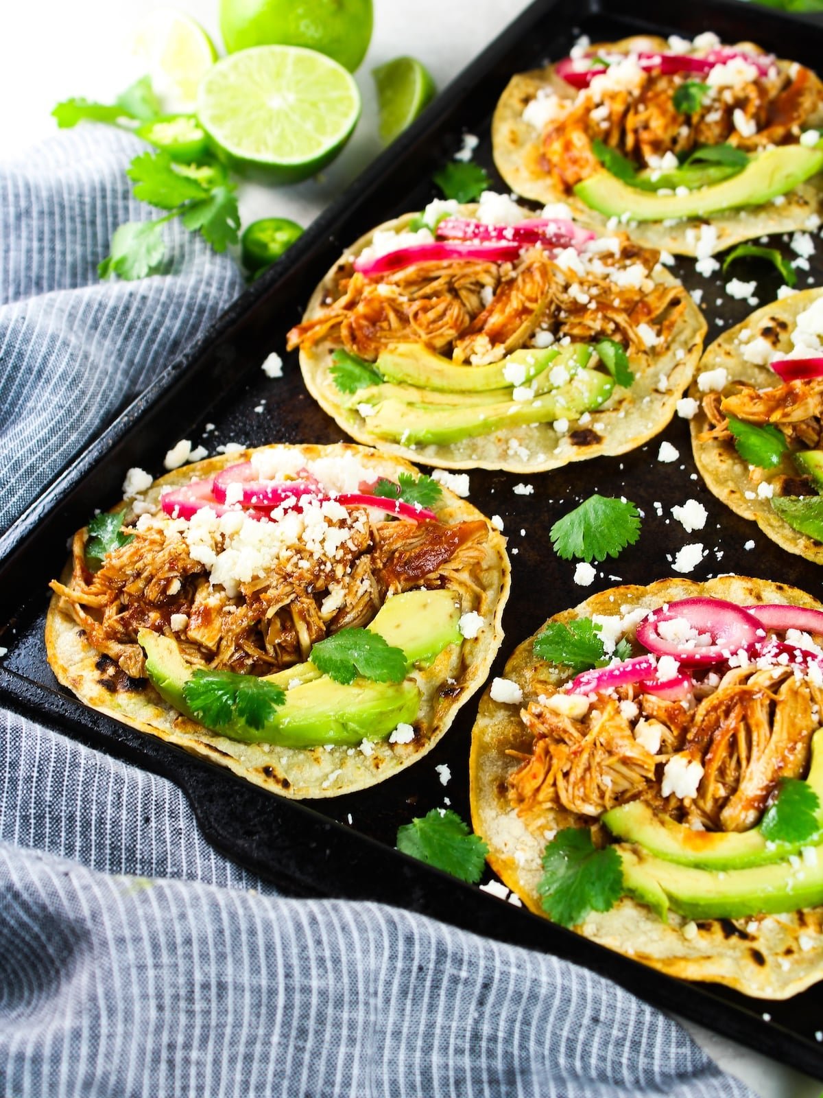 A baking sheet with a few tacos made from this recipe.