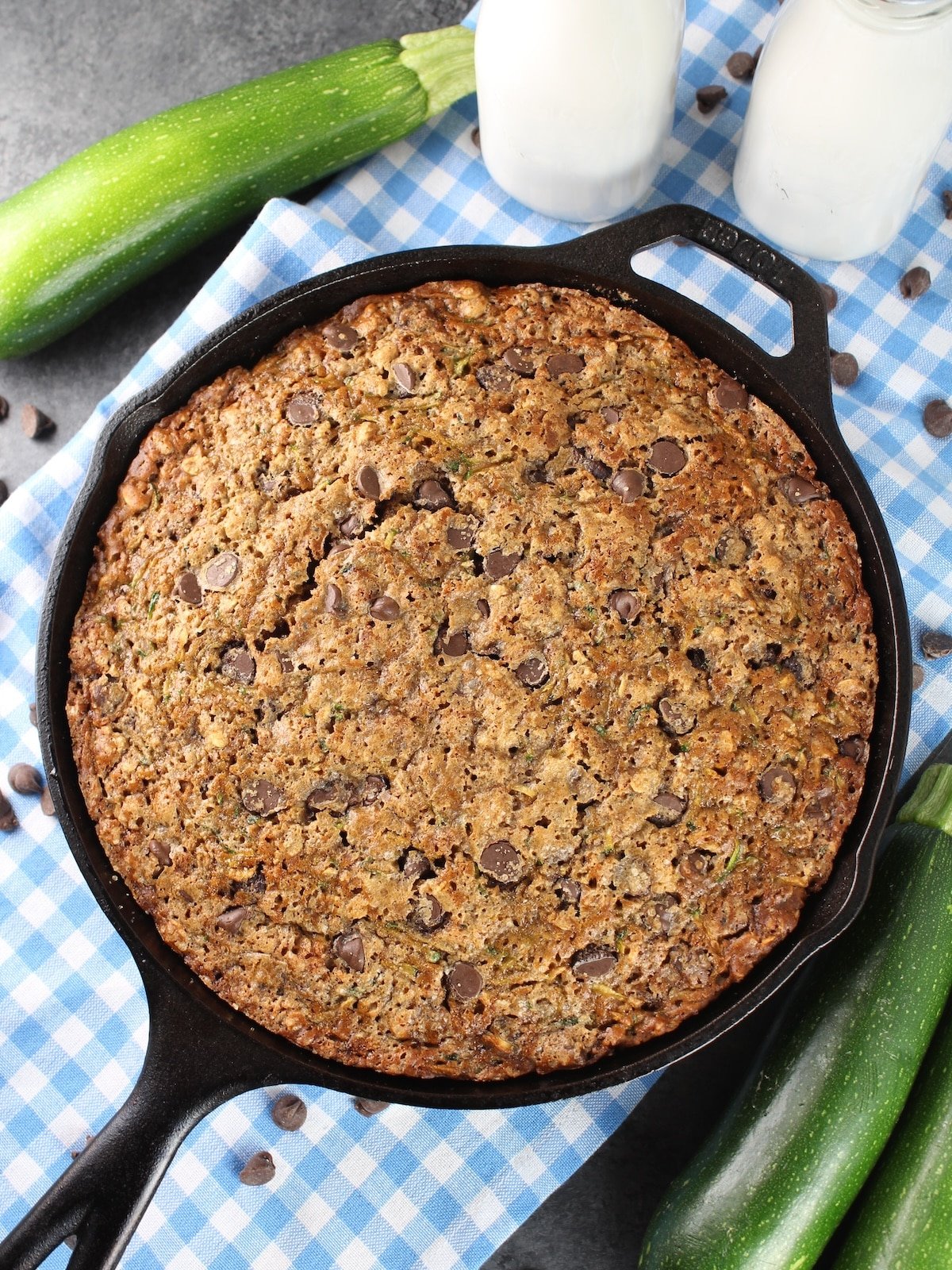 Chocolate Chip Zucchini Skillet Cake baked in a cast iron skillet.