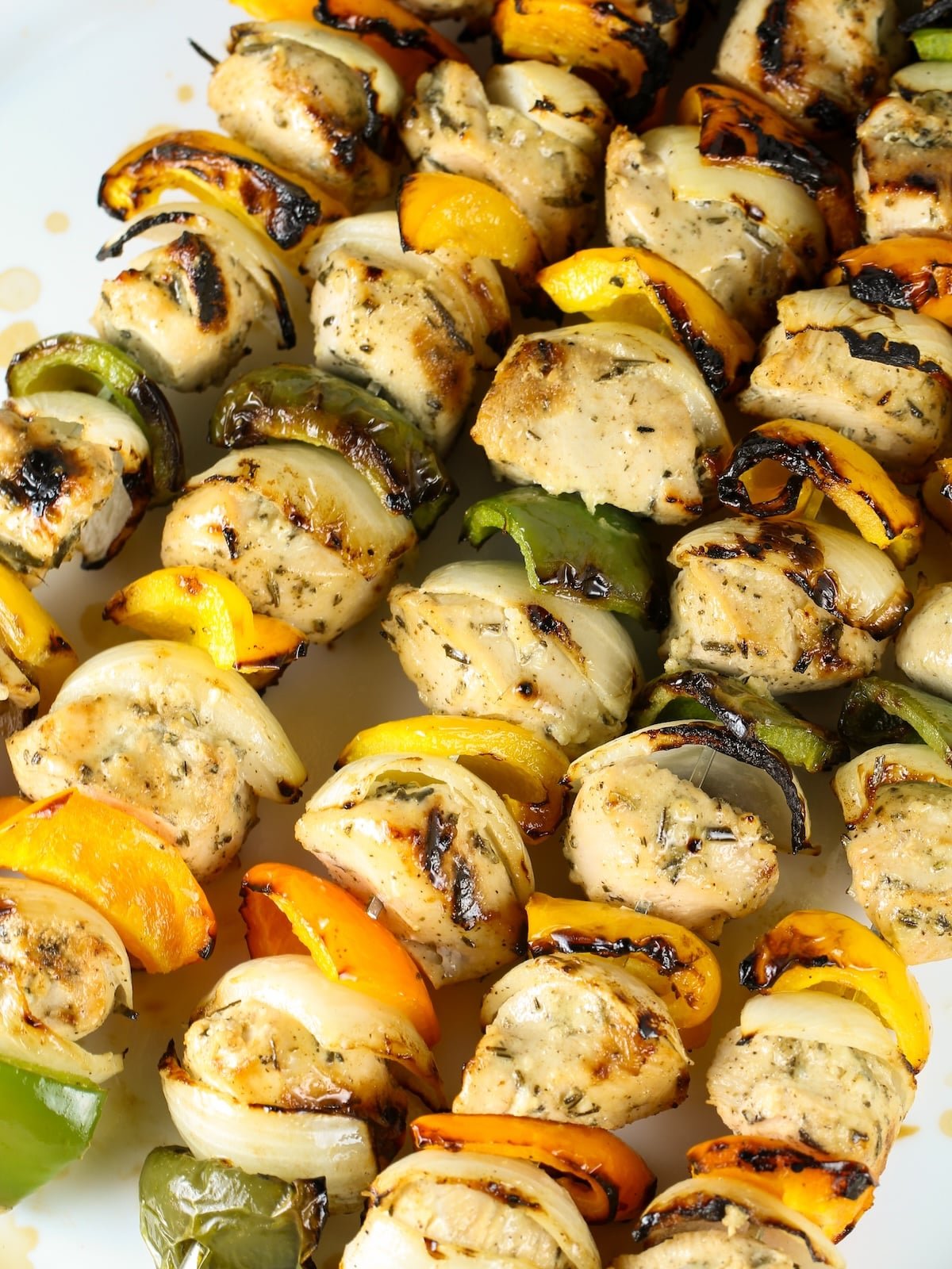 Close-up of Grilled Chicken Skewers on platter