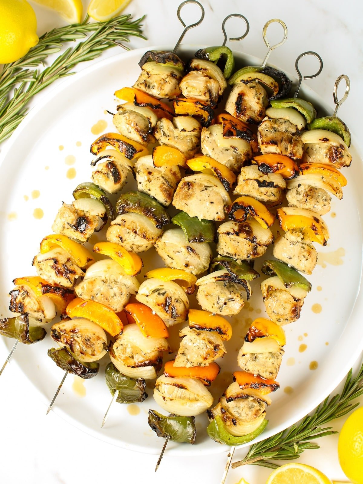 Skewers of Grilled Chicken Kabobs on a platter