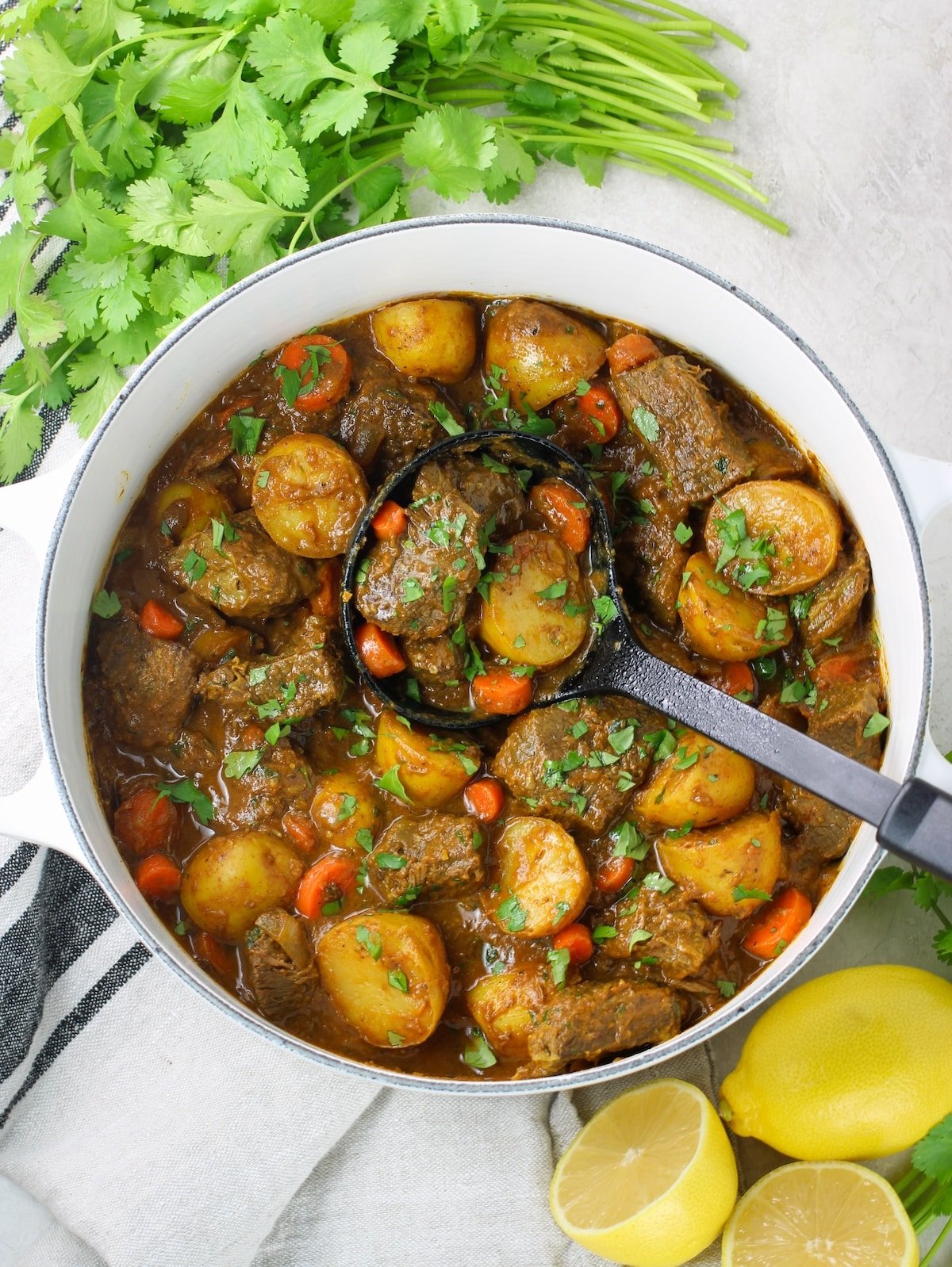 A pot of cooked Indian Beef Curry with Potatoes.