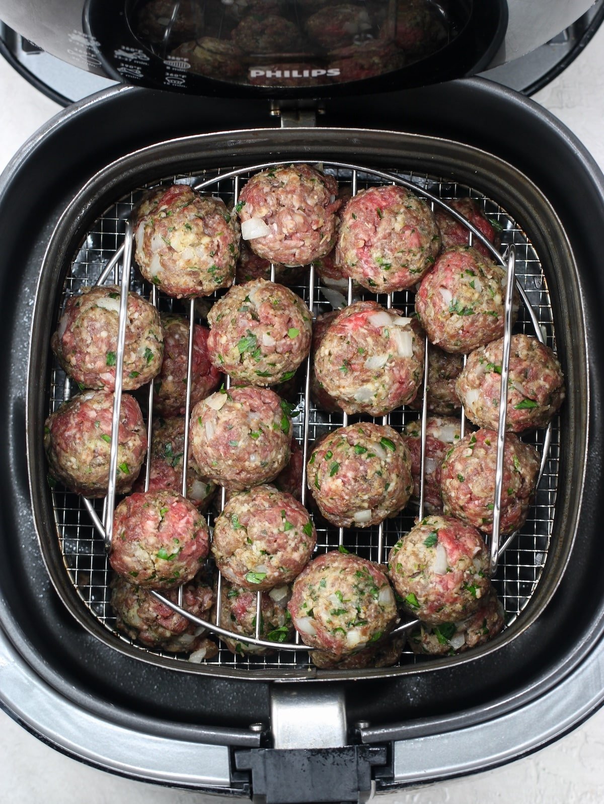 The meat mixture formed and ready to cook in the air fryer.