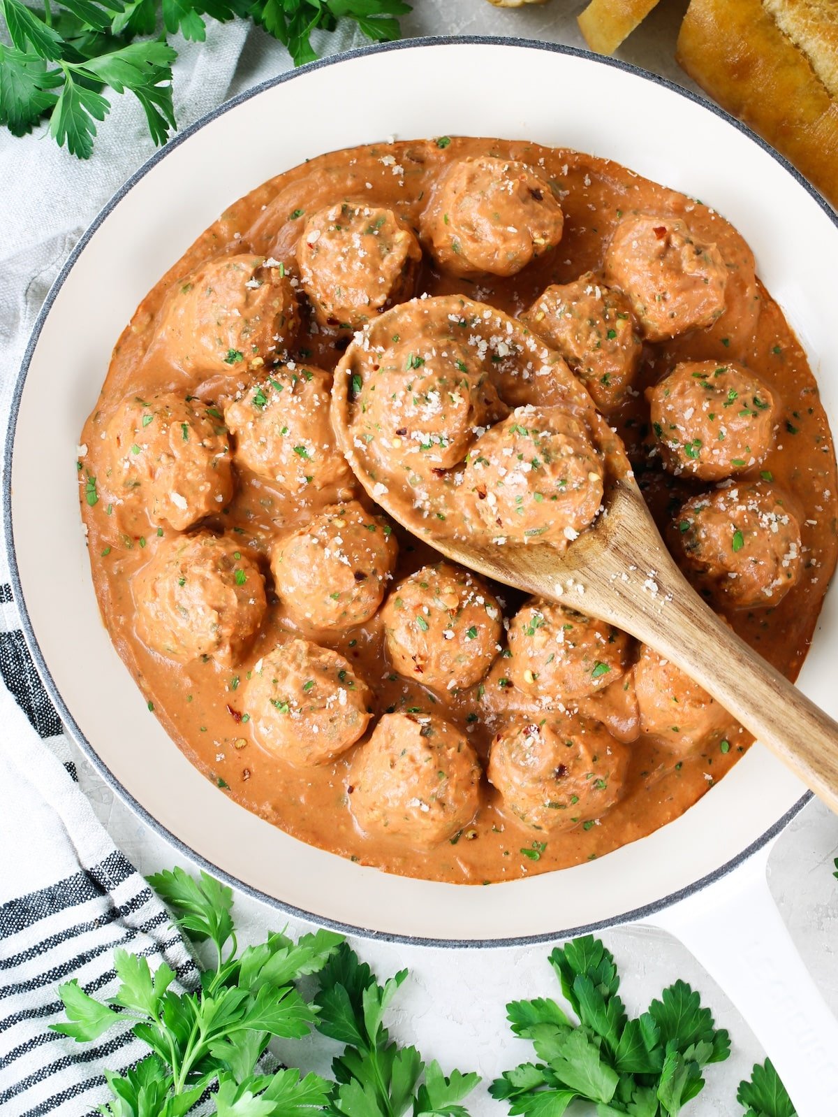 Baked meatballs in a creamy tomato sauce.