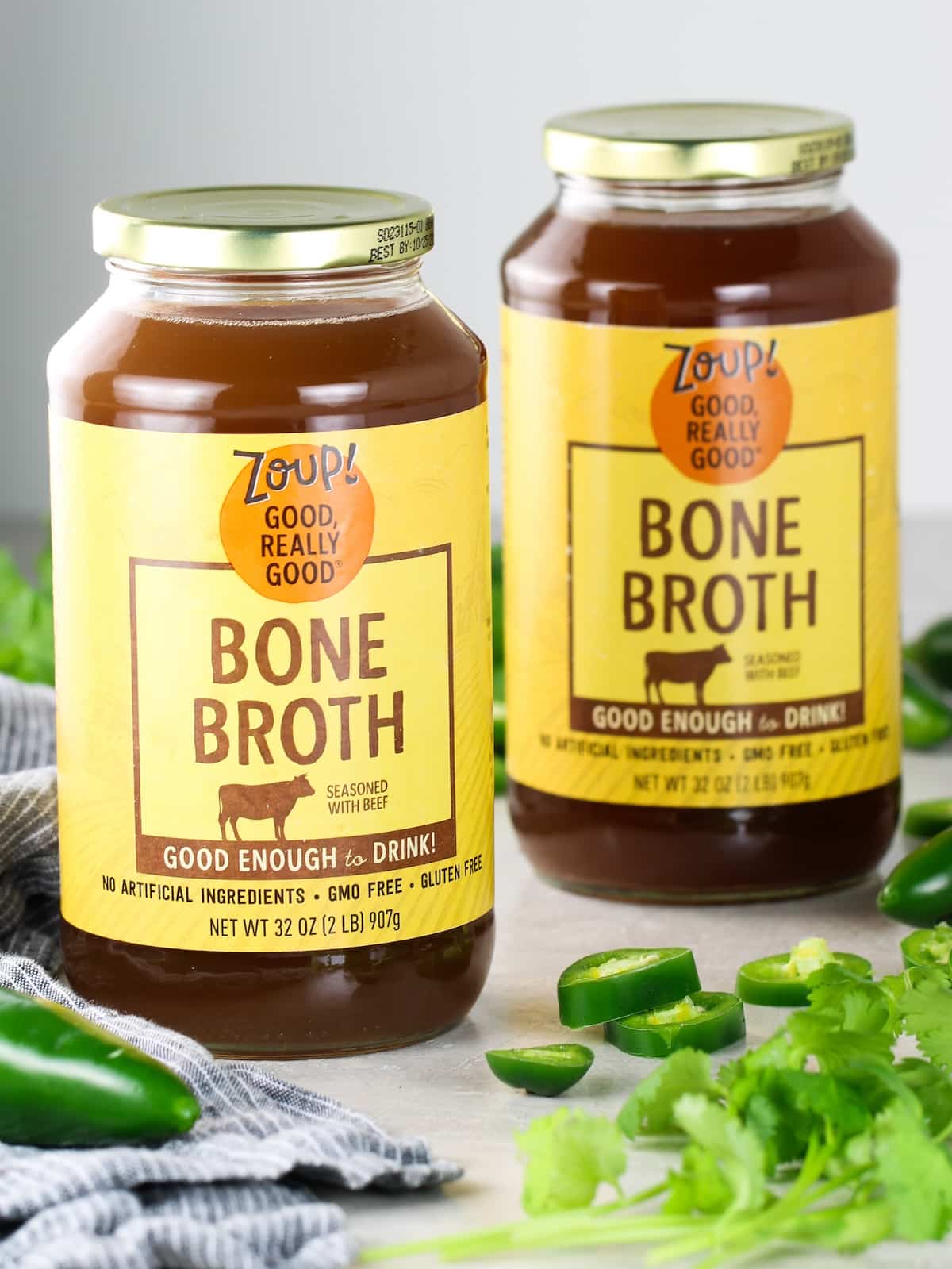 Two glass jars of Zoup! Beef Bone Broth.