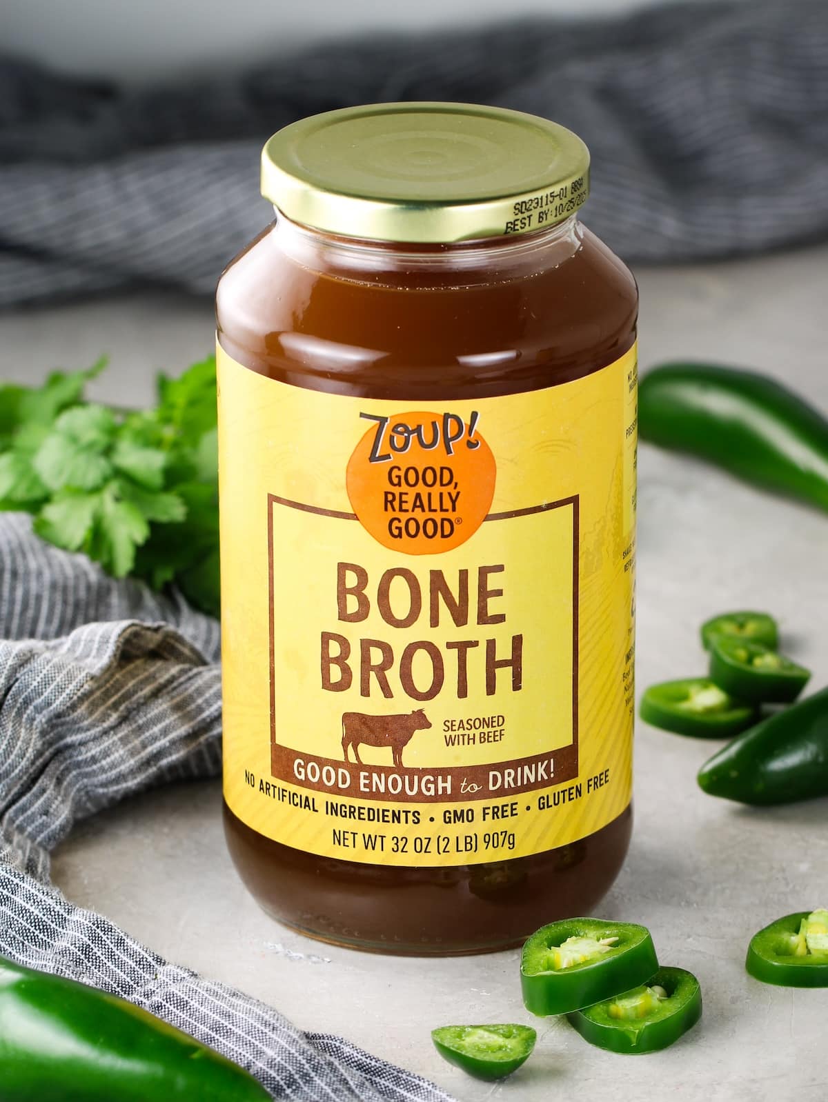 A glass jar with Zoup! Beef Bone Broth.