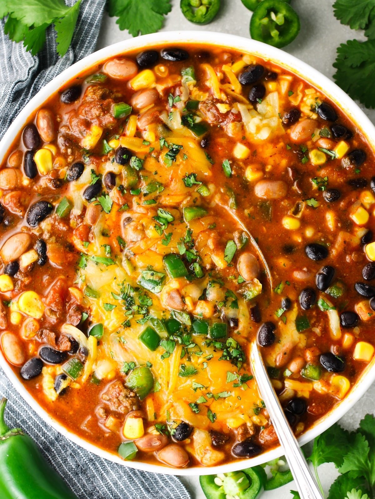 A bowl of soup made with Mexican spices, ground beef and Zoup! beef bone broth.