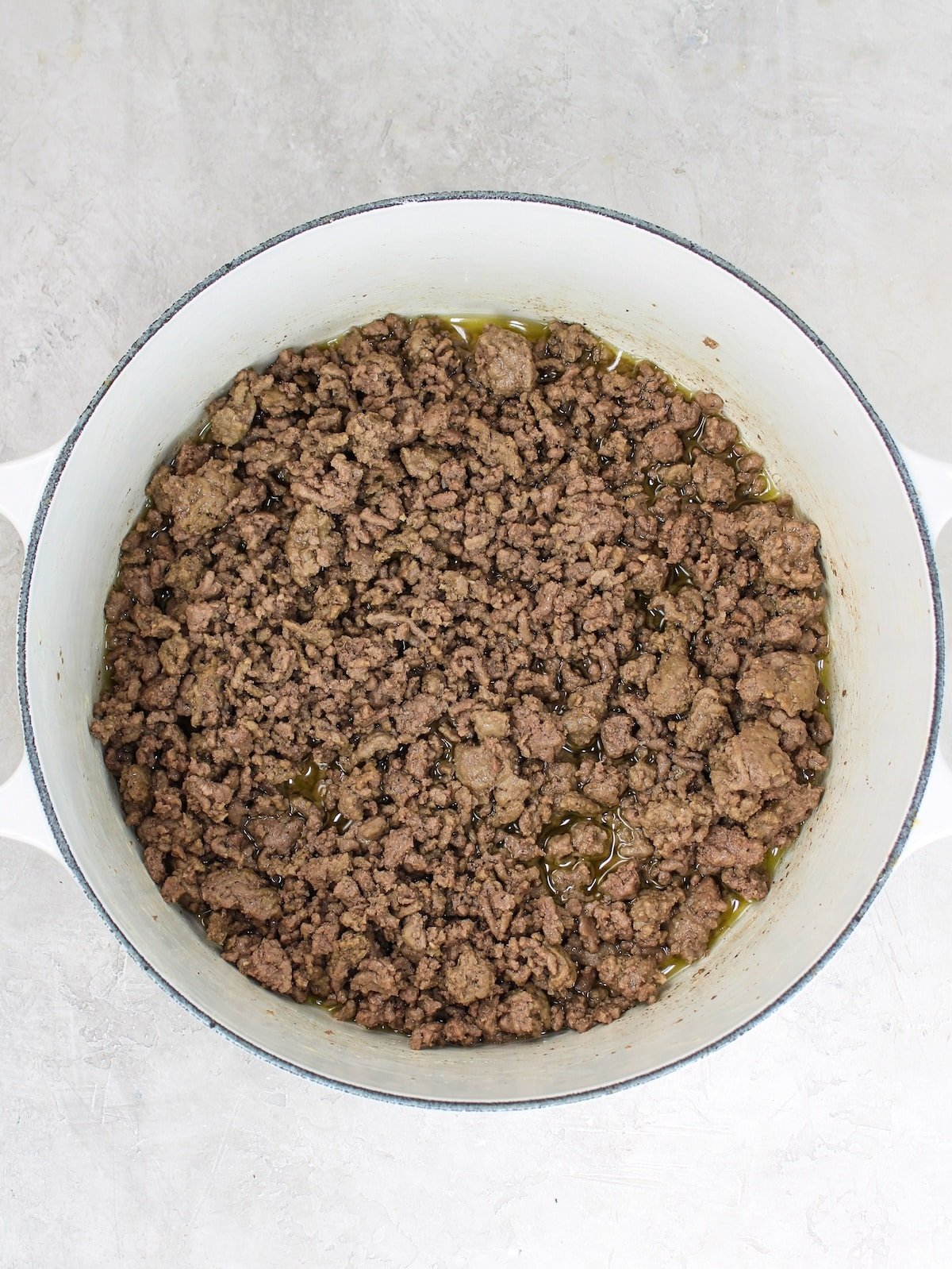 Cooked ground beef in a pot.