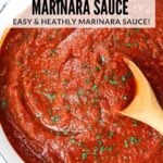 A Pinterest pin of hearty homemade marinara sauce in a pot with fresh herbs and garlic – easy, healthy, and made from scratch.