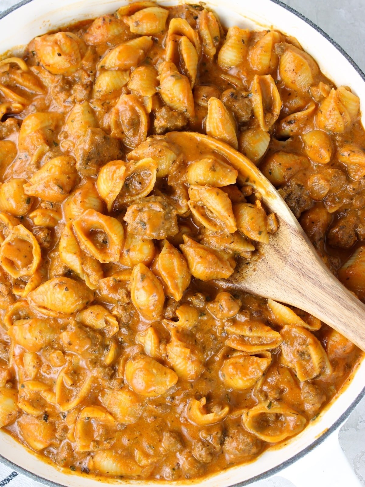 A creamy beef recipe for dinner in a skillet with a rich creamy tomato sauce.