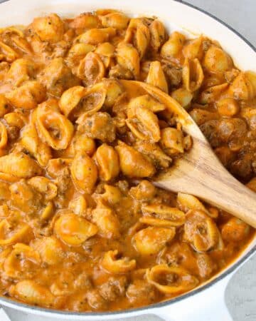 Creamy ground beef and pasta recipe cooked in a skillet.