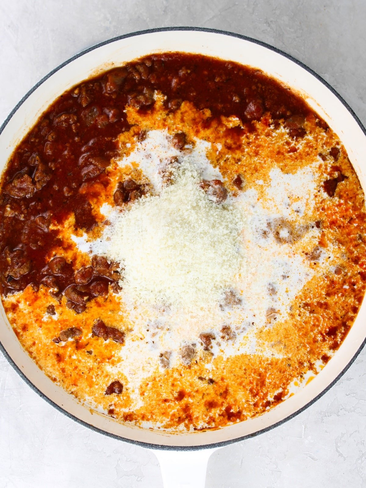 Heavy cream and Parmesan cheese added to the beef and pasta recipe.
