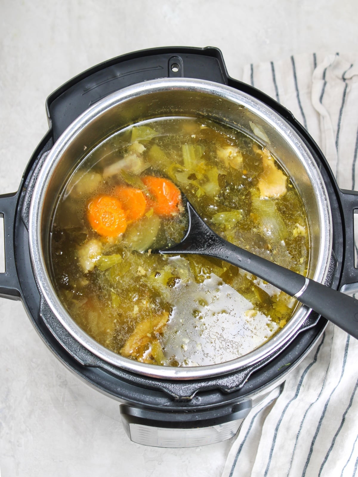 Vegetables, herbs, spices, apple cider vinegar, bones and water pressure cooked for the bone broth recipe.