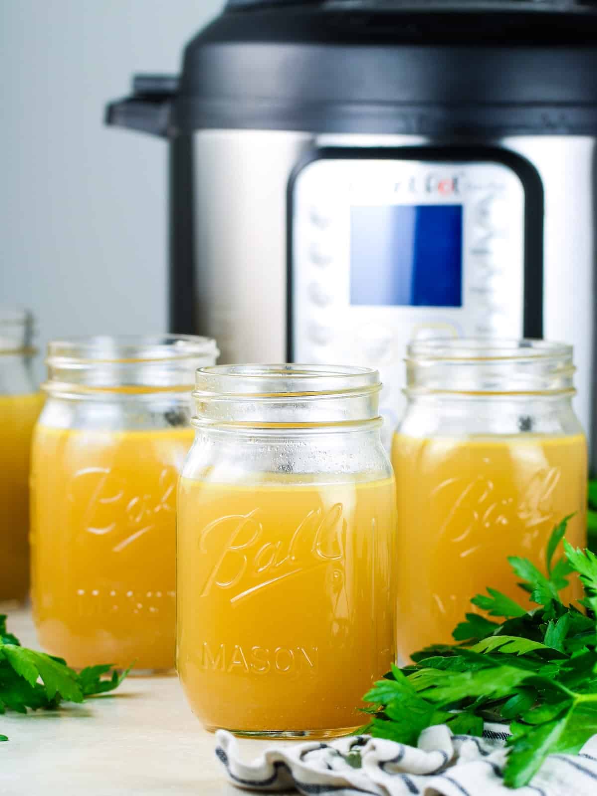 Bone broth recipe in glass jars.