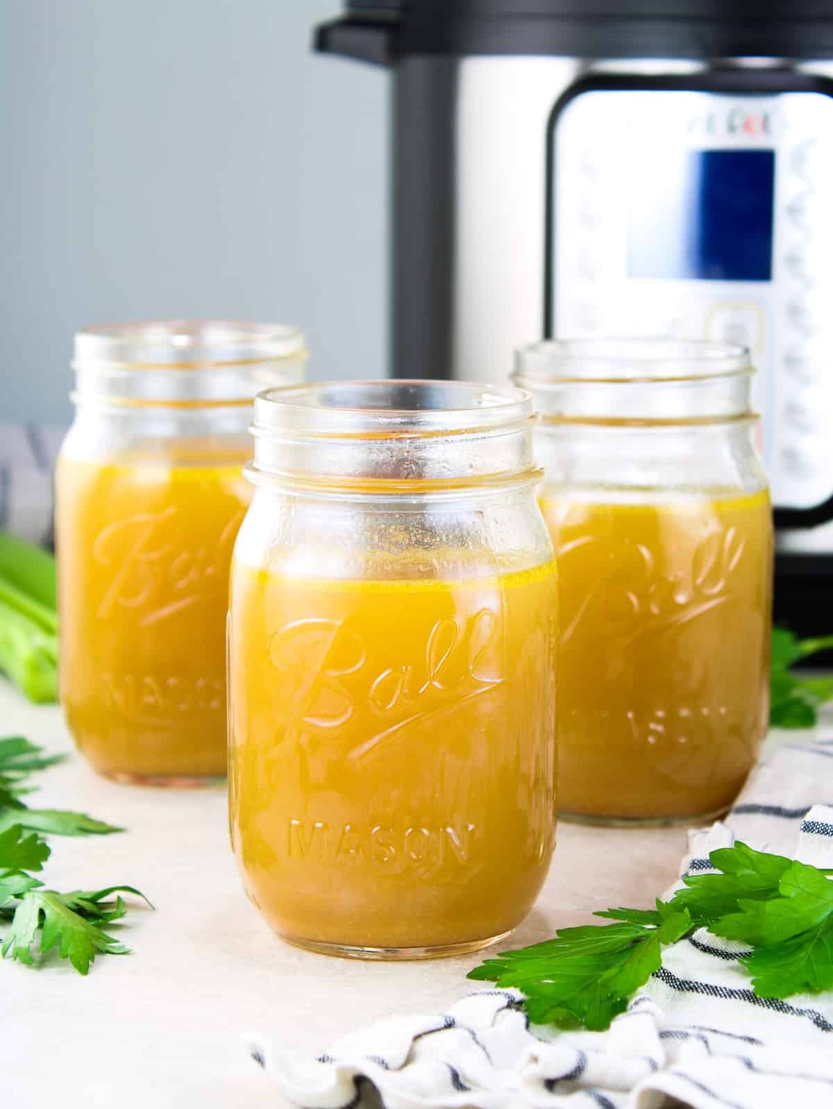 Bone broth recipe in glass jars.