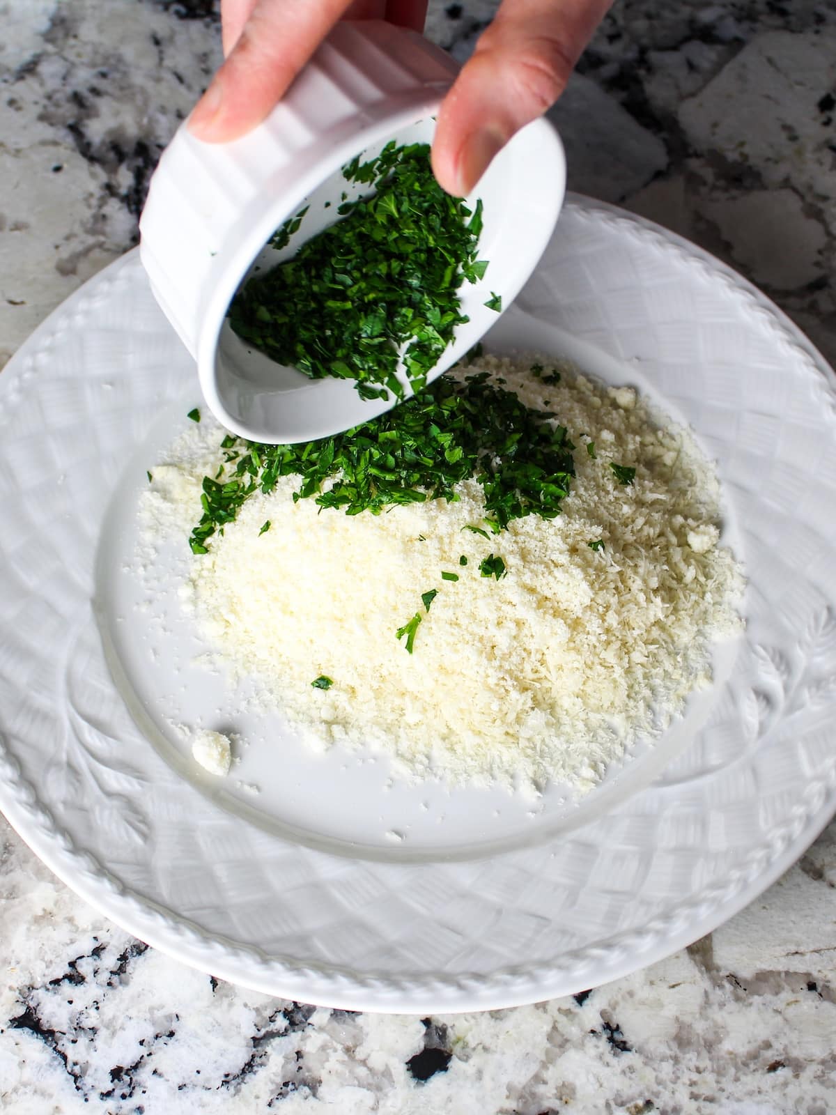 Freshly chopped parsley for the Parmesan crusted chicken coating.