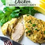 Sliced Parmesan crusted chicken on a plate showing golden panko-Parmesan coating and juicy meat.