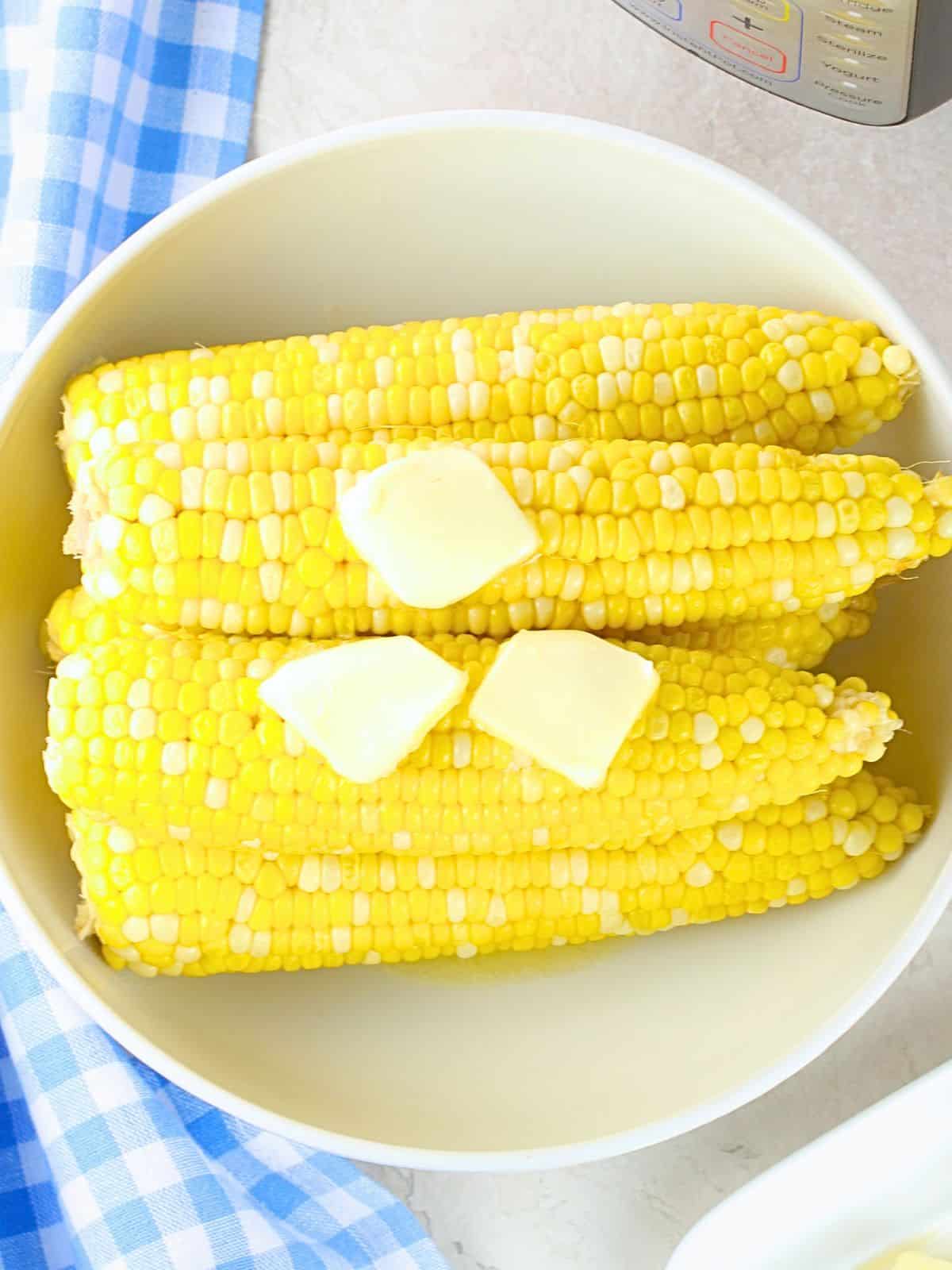 Instant Pot corn on the cob with melted butter — a fast and easy BBQ side dish that turns out perfectly every time